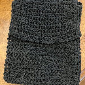 Boho-chic black woven handbag by Xhilaration